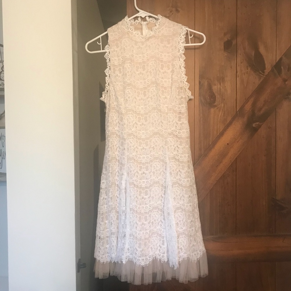 Francesca’s white lace dress